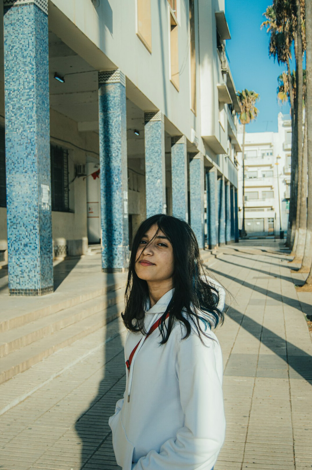 Studio portrait of a Portuguese woman data journalist in her 20s