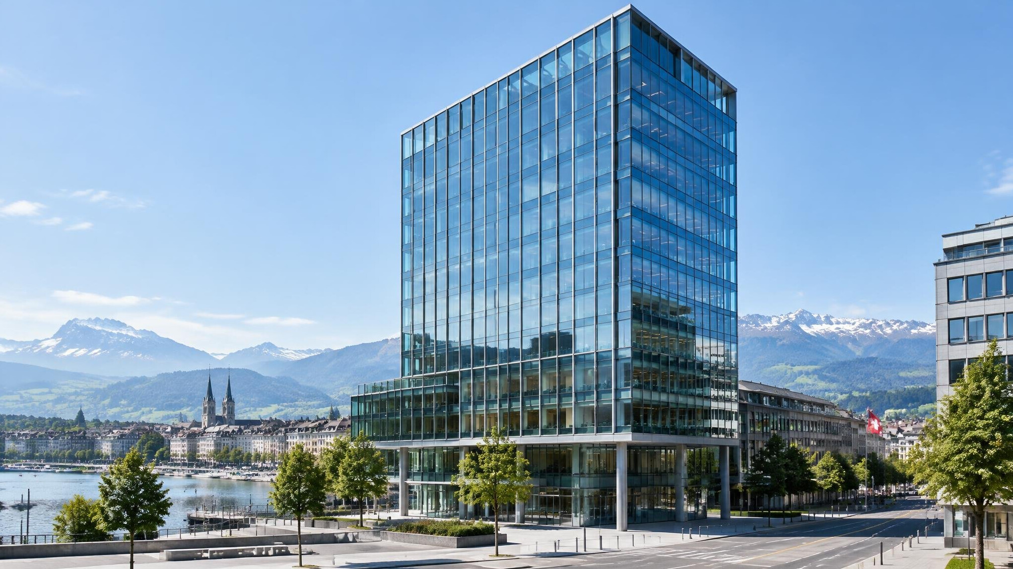 Modern glass corporate office tower in a Swiss city