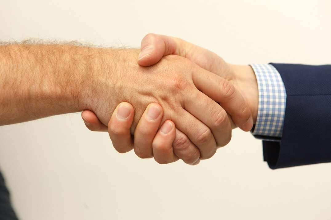 executives shaking hands