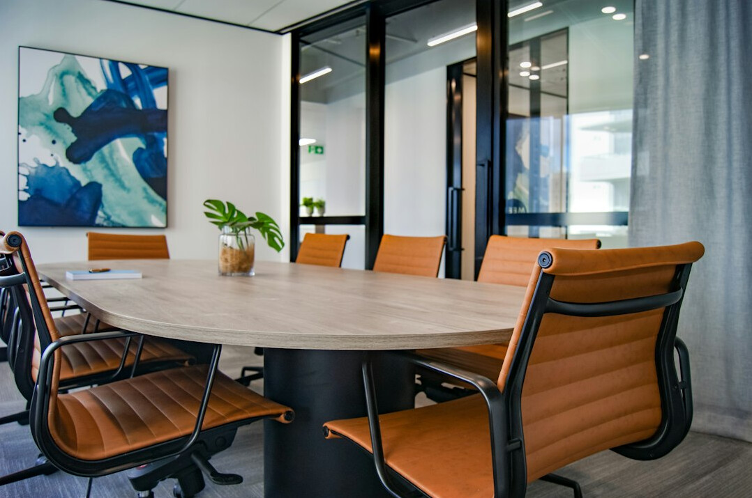 shadowy boardroom meeting